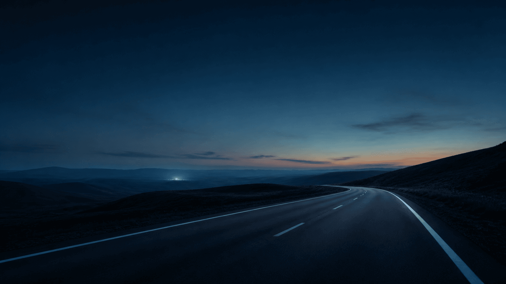 Open road at dusk, representing electric mobility
